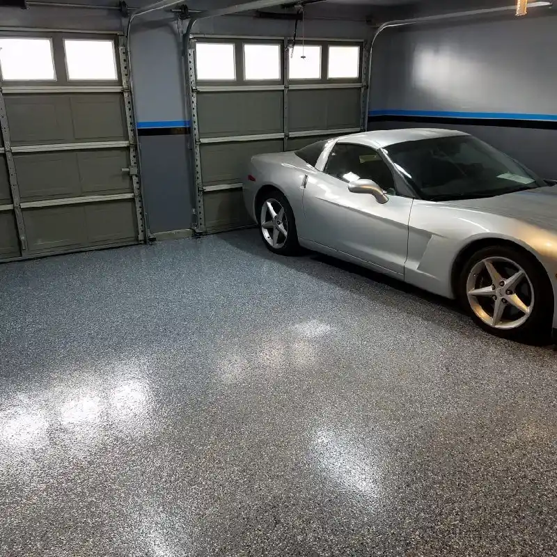 Shiny silver and gray speckled garage epoxy flooring